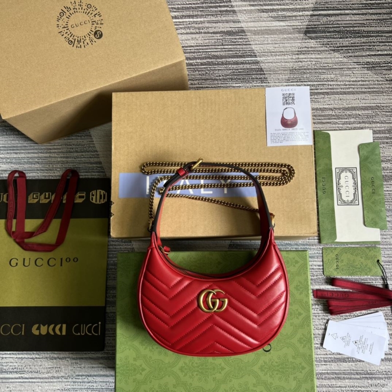 G*u*i top handle bags